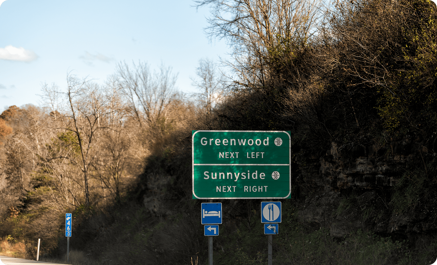 Road signs to Greenwood and Sunnyside