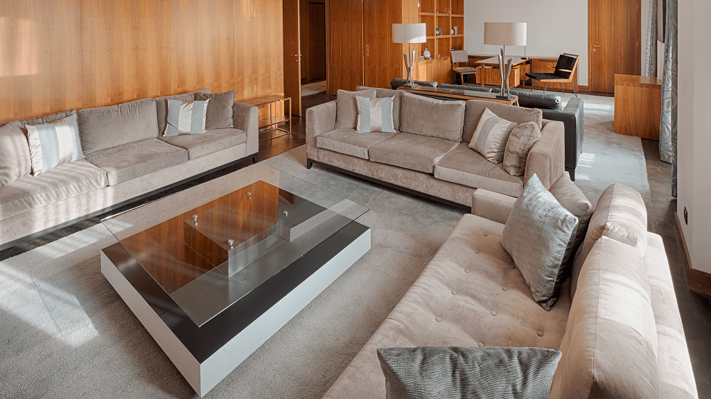 Modern living room with beige sofas